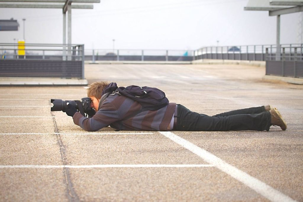 You don’t mind getting your clothes dirty to capture the perfect angle for your photo